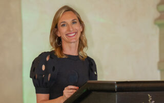 President & CEO, Erin White, at the 2025 Fashion & Compassion Event